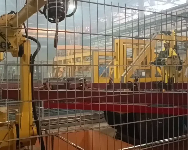 Сварочная ячейка с роботами FANUC на линии сварки стенки вагона